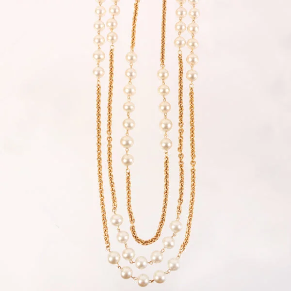 CHANEL Triple Pearl Long Chain Necklace